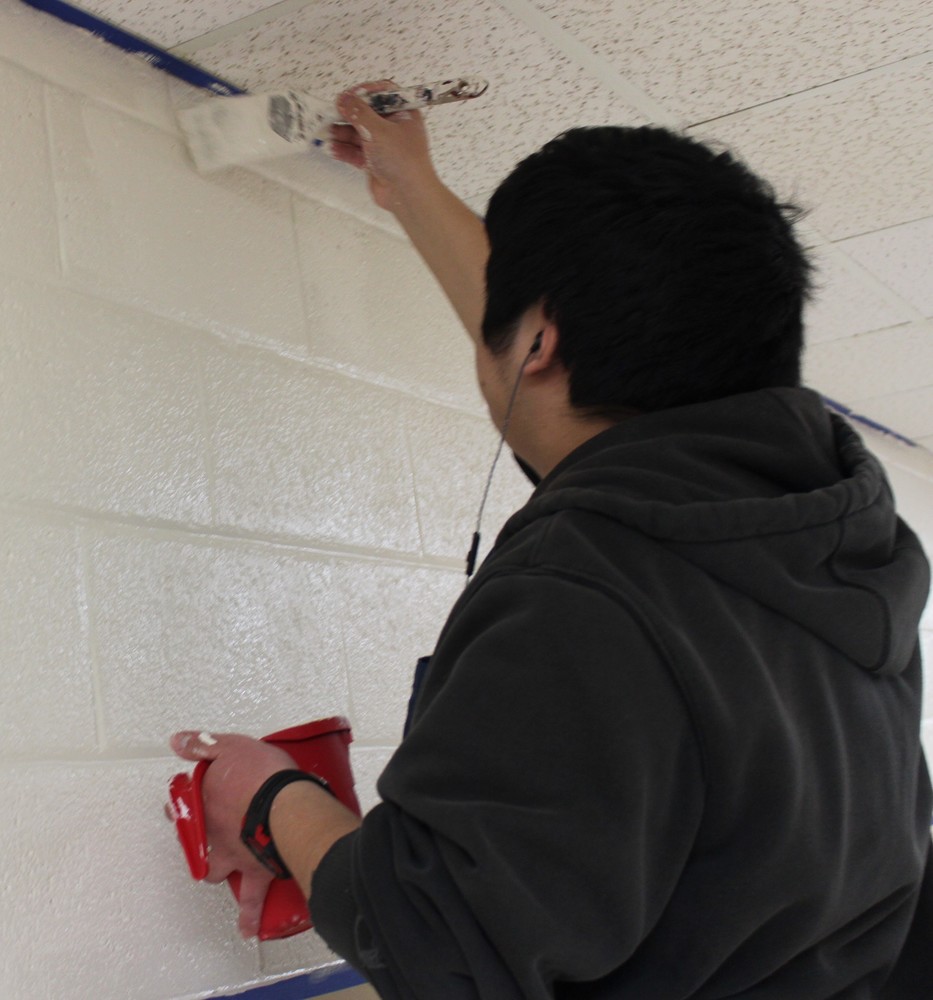 Students painting the Hallways