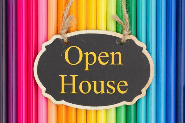 Open House Sign over colored pencils