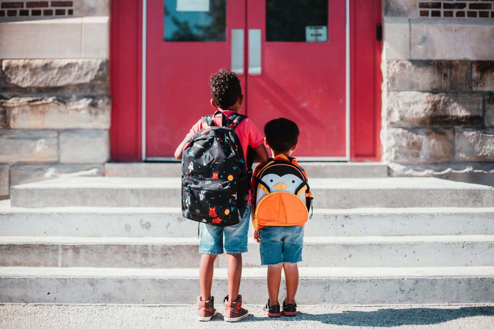 Students in front of school