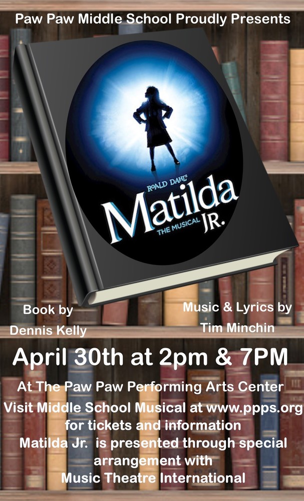 Book titled Matilda Jr. in front of a bookcase and musical ticket informatoin.