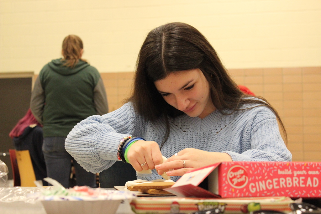 Alyssa Abernathy focuses on building the base of her gingerbread house