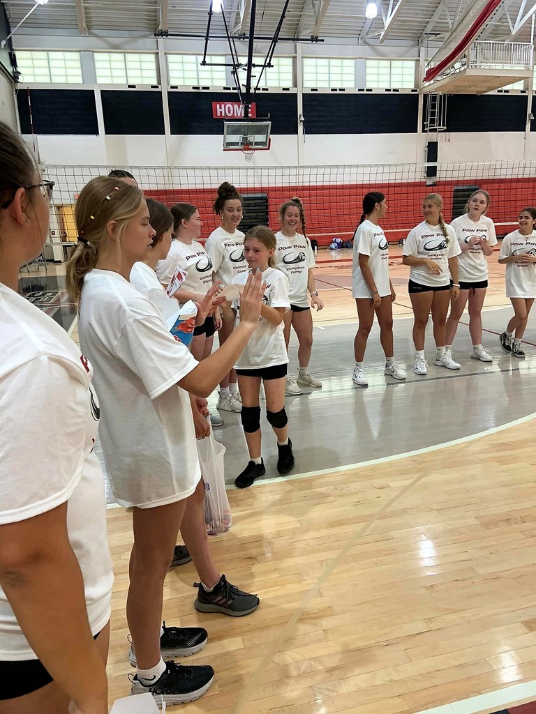 volleyball camp kids celebrating