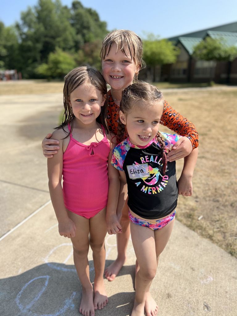 3 girls in swimsuits