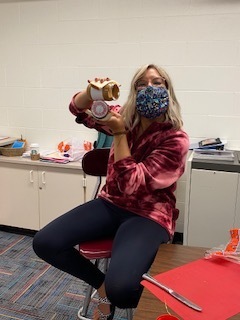 Mrs. Laurian making a PB&J sandwich